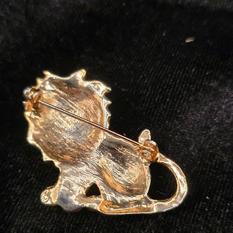 Gold-tone seated lion brooch with clear rhinestones and green eyes, view 3
