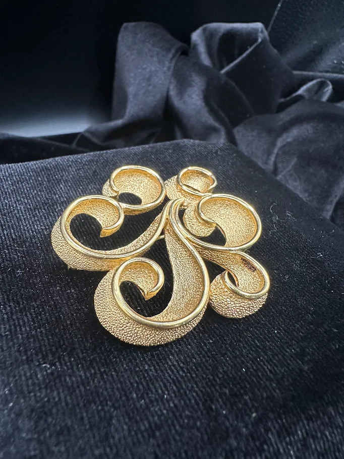 Signed Trifari gold-tone openwork scroll brooch, view 3