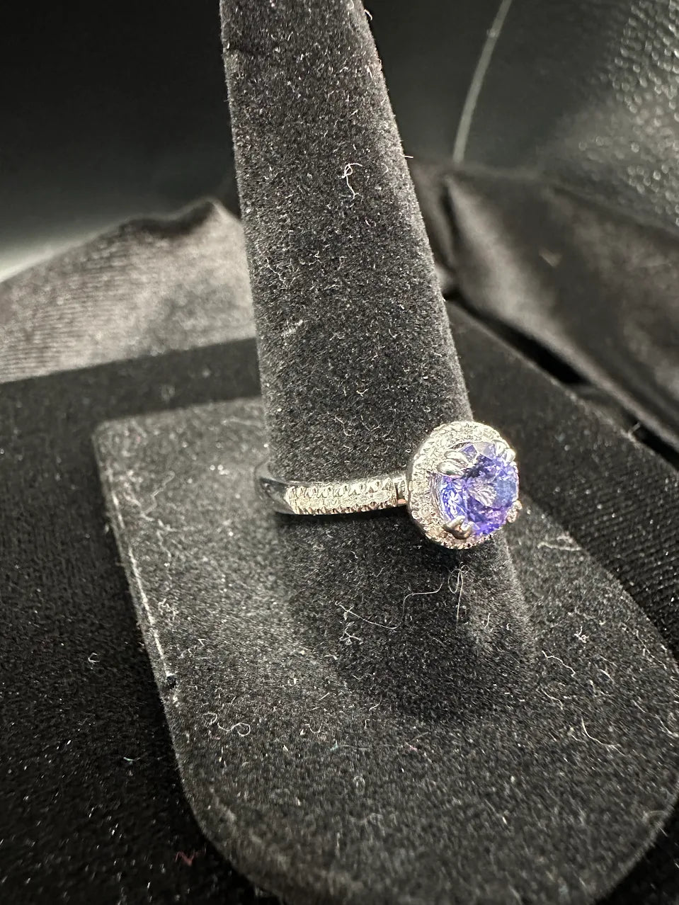 Silver-tone ring with round purple crystal center and clear crystal halo, view 3