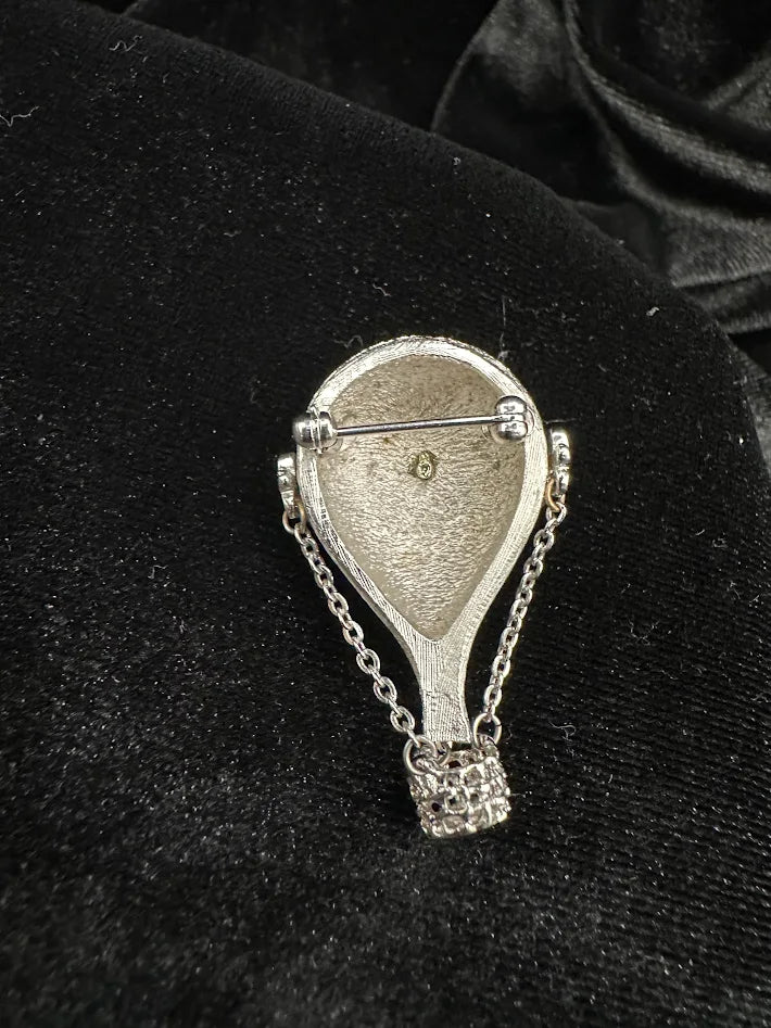 Silver-tone hot air balloon brooch with textured canopy and basket suspended on chains, view 2