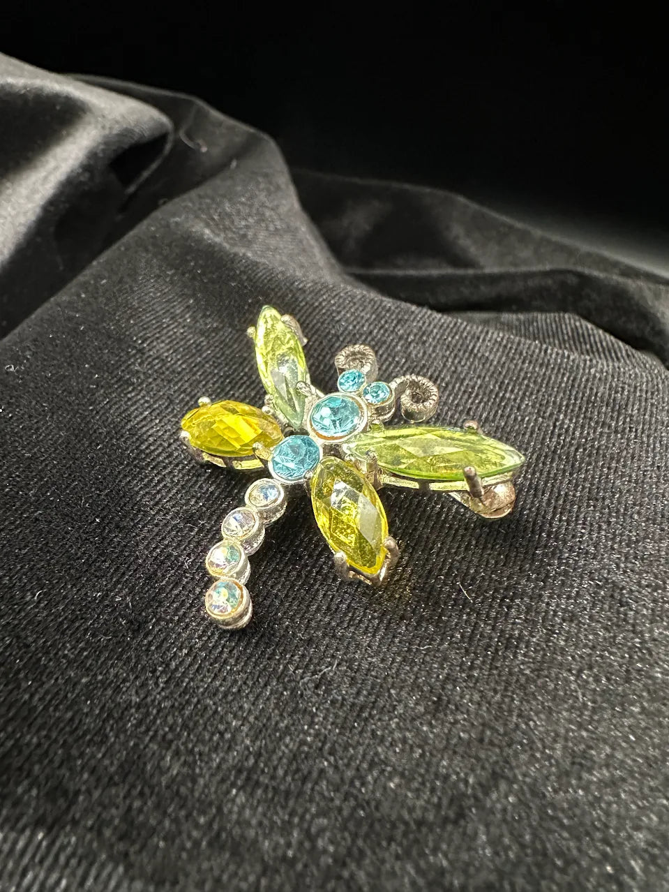 Silver-tone dragonfly brooch with green marquise crystal wings and blue crystal body, view 5