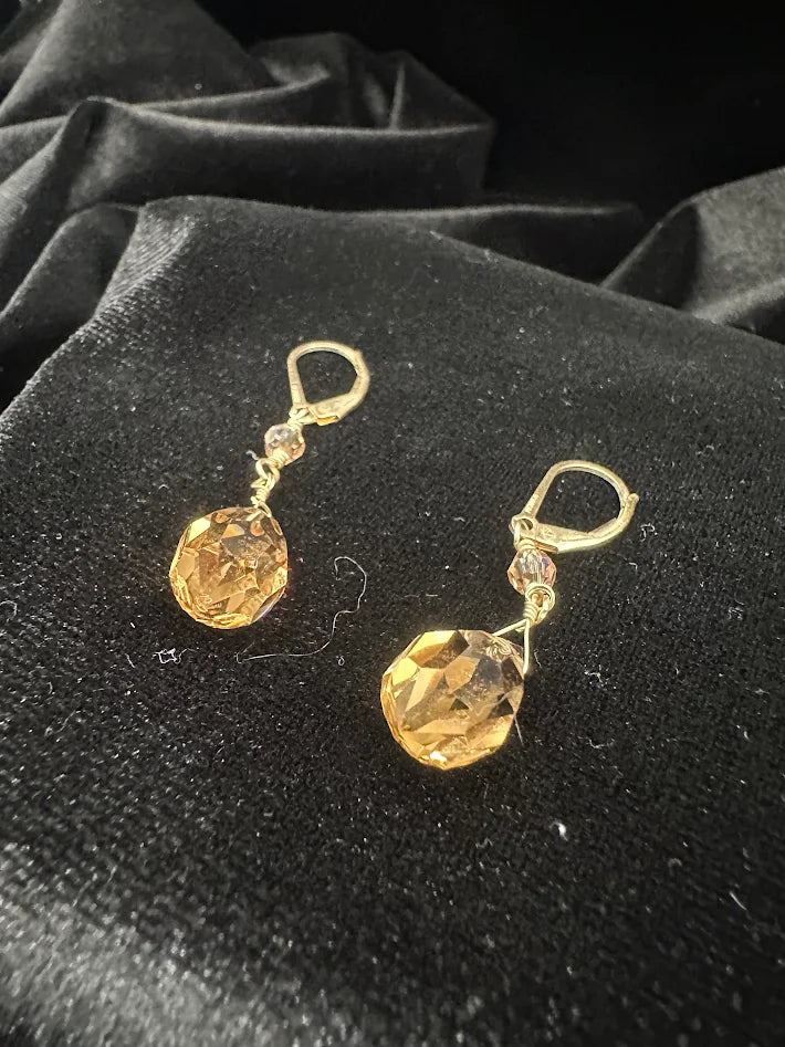 Gold-tone leverback drop earrings with faceted amber teardrop crystals, view 2