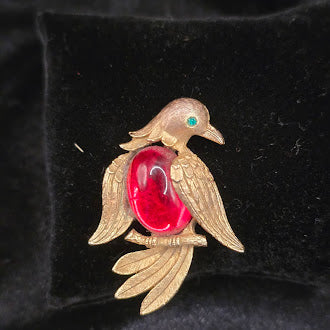 Signed JJ gold-tone bird brooch with translucent red belly and green eye, view 2
