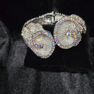 Vintage Silver Tone Rhinestone Clamper Bangle Bracelet with Double Swirl Flower Ends, Iridescent Crystal Halo, 7 Inch Estate Statement Style