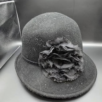 Black felt cloche hat with short brim, narrow band and layered flower accent, view 2