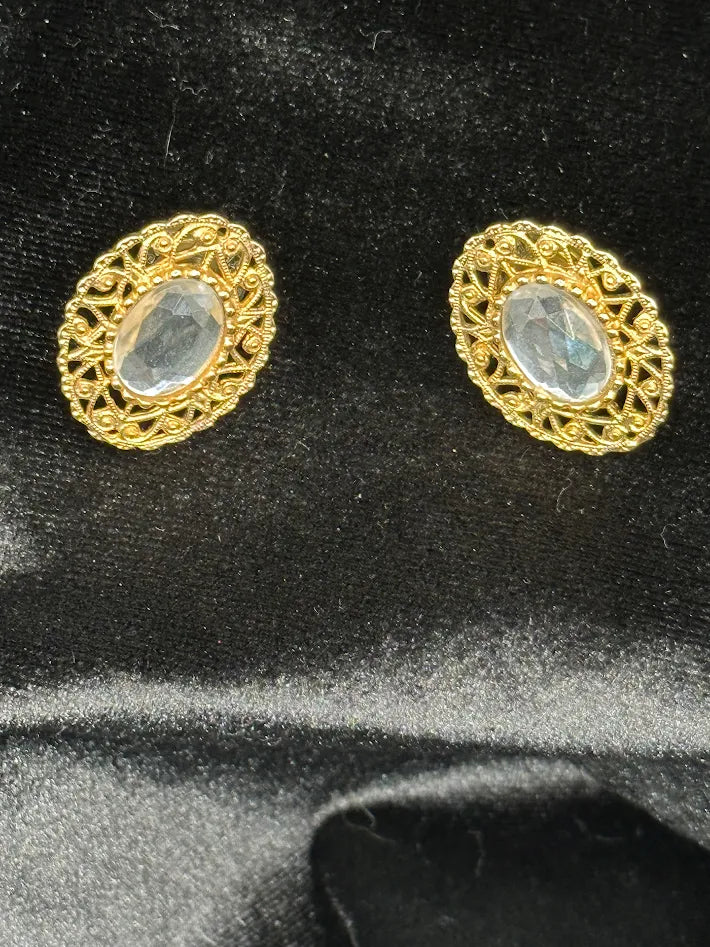 1960s–70s Sarah Coventry Gold Tone Filigree Clip Earrings Oval Clear Crystal Cabochon Statement Jewelry