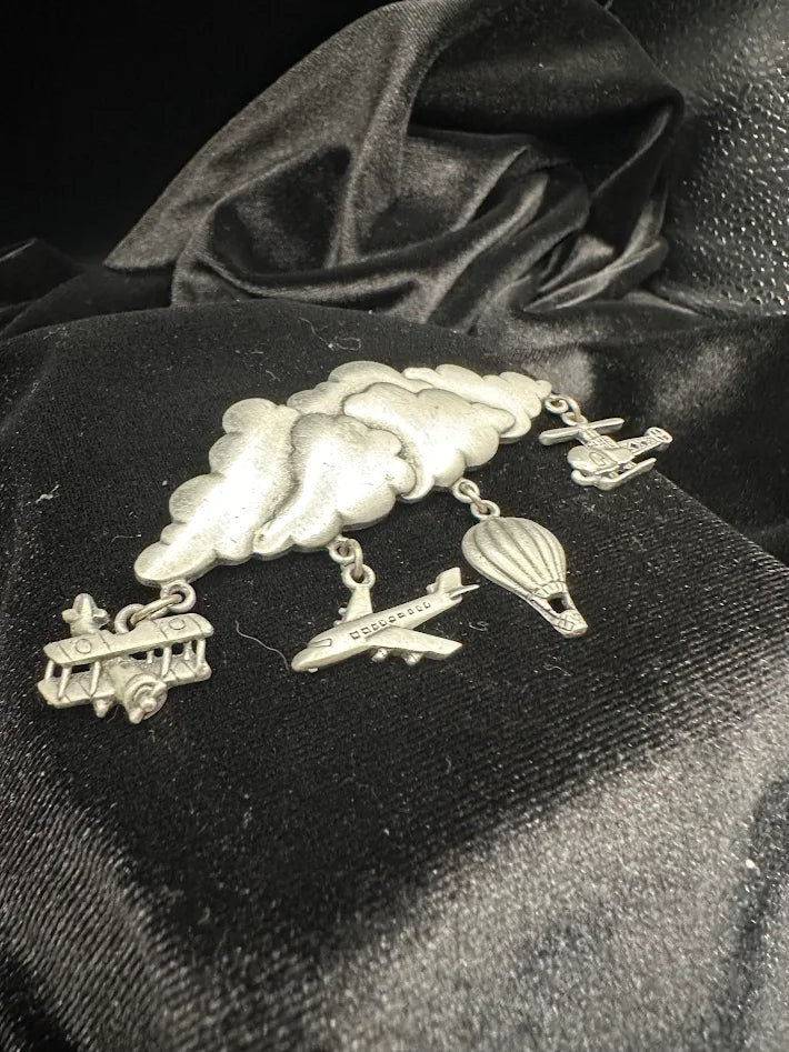 Signed JJ silver-tone cloud brooch with dangling airplanes, helicopter and hot air balloon, view 4
