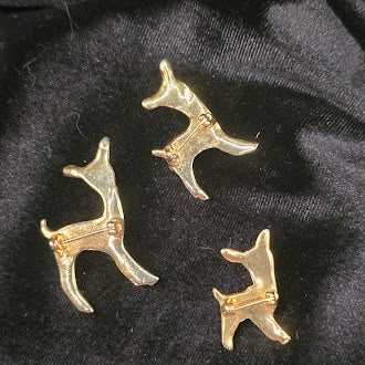 Set of three small white enamel fawn brooches with black spots, view 3