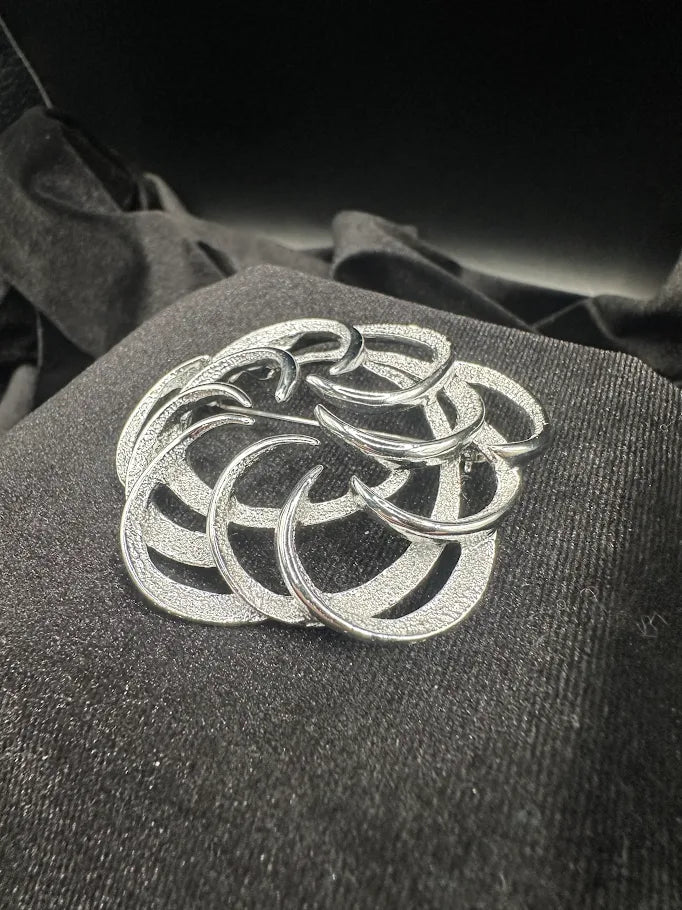 Signed Sarah Coventry silver-tone abstract openwork loop brooch, view 3