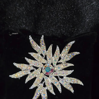 Signed Sarah Coventry silver-tone starburst brooch with clear and aurora borealis rhinestones, view 2