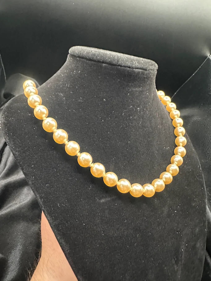 Single strand cream faux pearl necklace with gold-tone filigree clasp, view 4