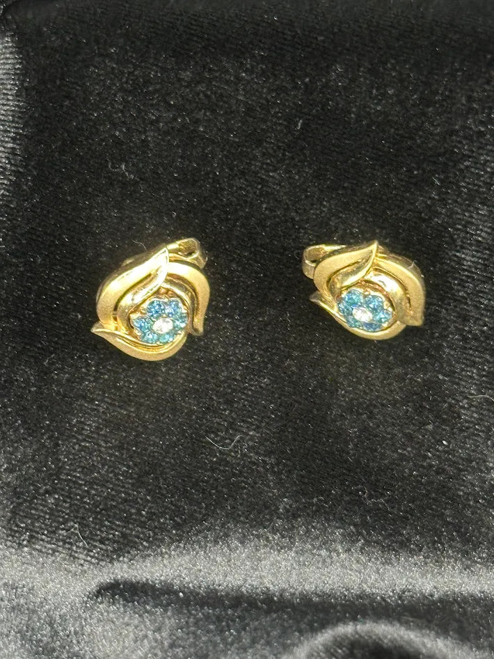Crown Trifari Gold Tone Blue Crystal Clip Earrings Swirl Floral Vintage Designer Jewelry
