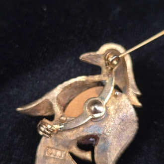 Signed JJ gold-tone bird brooch with translucent red belly and green eye, view 3