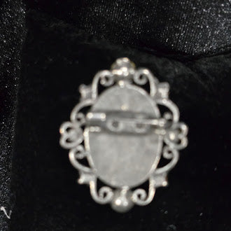 Early 1990s to 2000s Cameo Brooch Silver Tone Oval Portrait Pin with Pink Purple Rhinestones Scrollwork Frame Safety Clasp