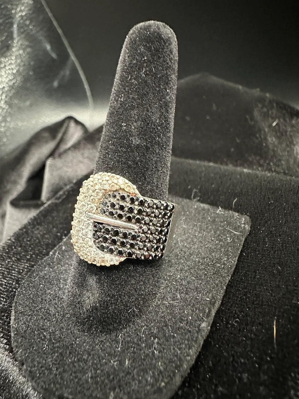 Silver-tone wide band buckle ring set with black crystals and clear crystal outline, view 3