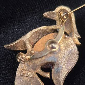 Signed JJ gold-tone bird brooch with translucent red belly and green eye, view 4