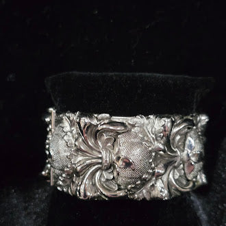 Vintage Repousse Silver Tone Hinged Bangle Bracelet with Ornate Floral Scrollwork, Victorian Revival Design, Wide Statement Cuff Style
