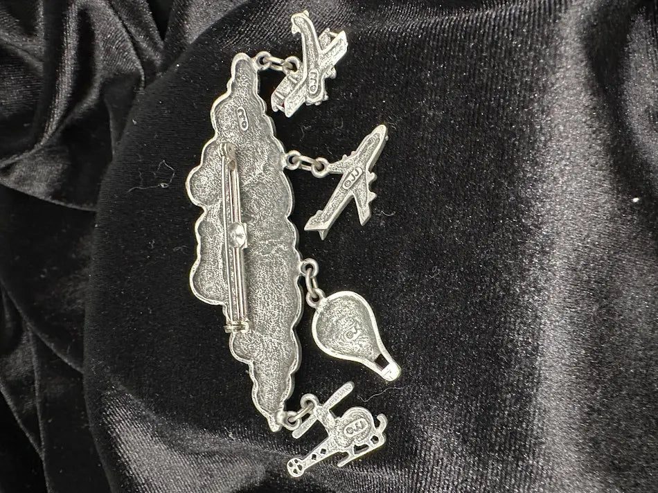 Signed JJ silver-tone cloud brooch with dangling airplanes, helicopter and hot air balloon, view 3