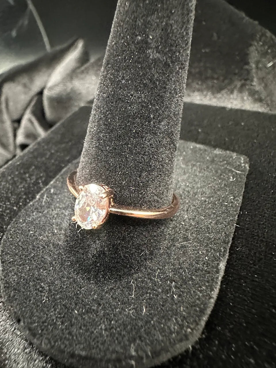 Rose gold-tone solitaire ring with oval clear crystal in open prong setting, view 3
