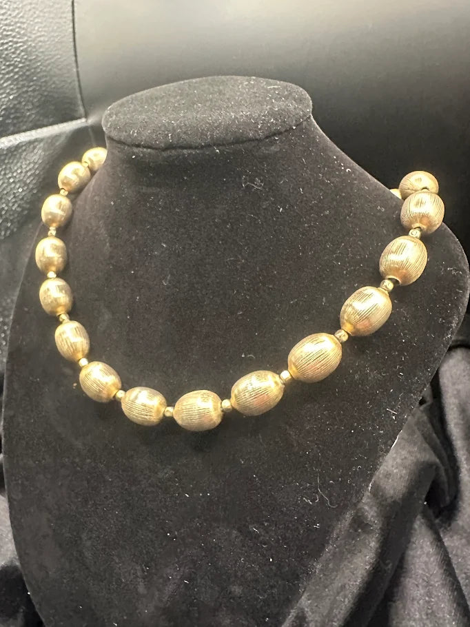 Signed Trifari gold-tone textured oval bead necklace, view 5