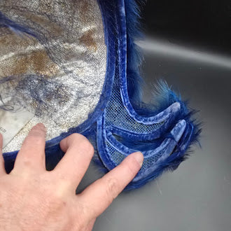 Lisa New York blue feather hat with net trim