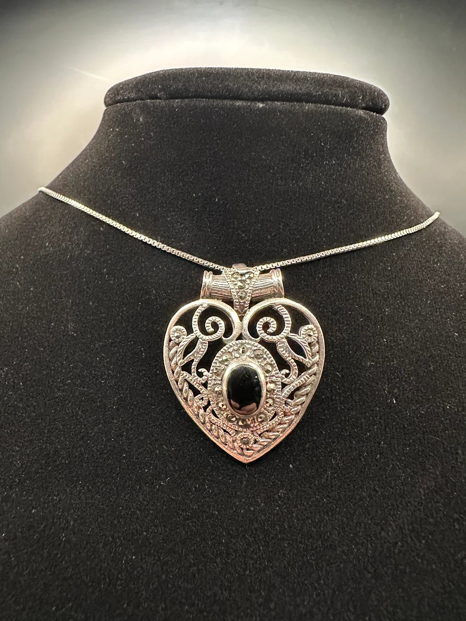 Silver tone black stone heart pendant necklace openwork scroll design