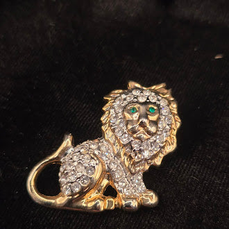 Gold-tone seated lion brooch with clear rhinestones and green eyes, view 2