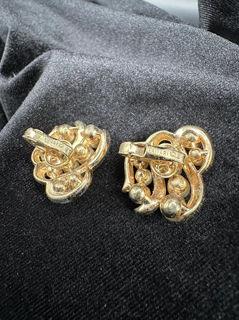Signed Trifari gold-tone swirl clip earrings with clustered faux pearls, view 6