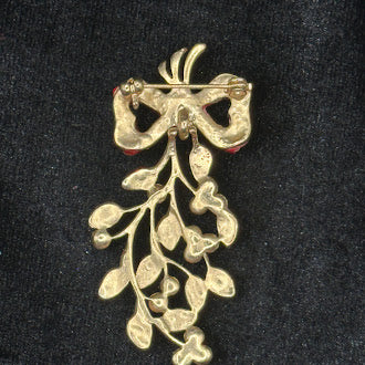 Gold-tone mistletoe Christmas brooch with red rhinestone bow and green enamel leaves, view 3