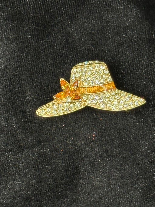 Signed Monet gold-tone sun hat brooch paved with clear rhinestones and amber accent, view 4