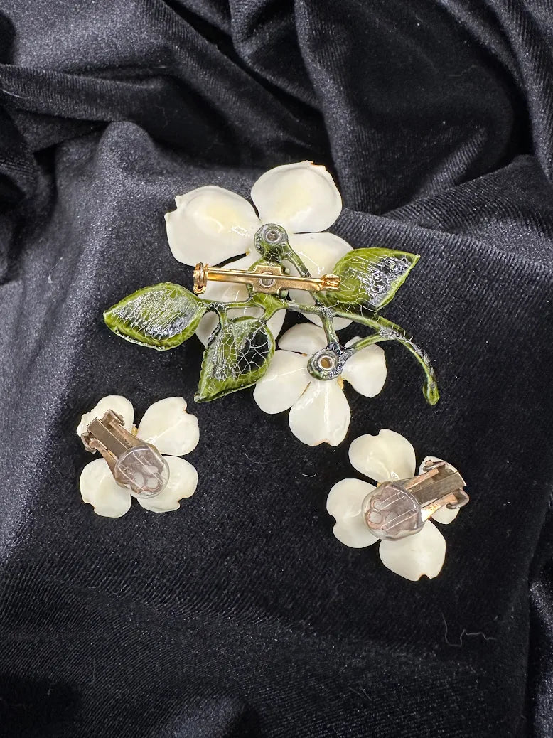 White dogwood flower brooch and clip earrings with orange bead centers and green enamel leaves, view 4