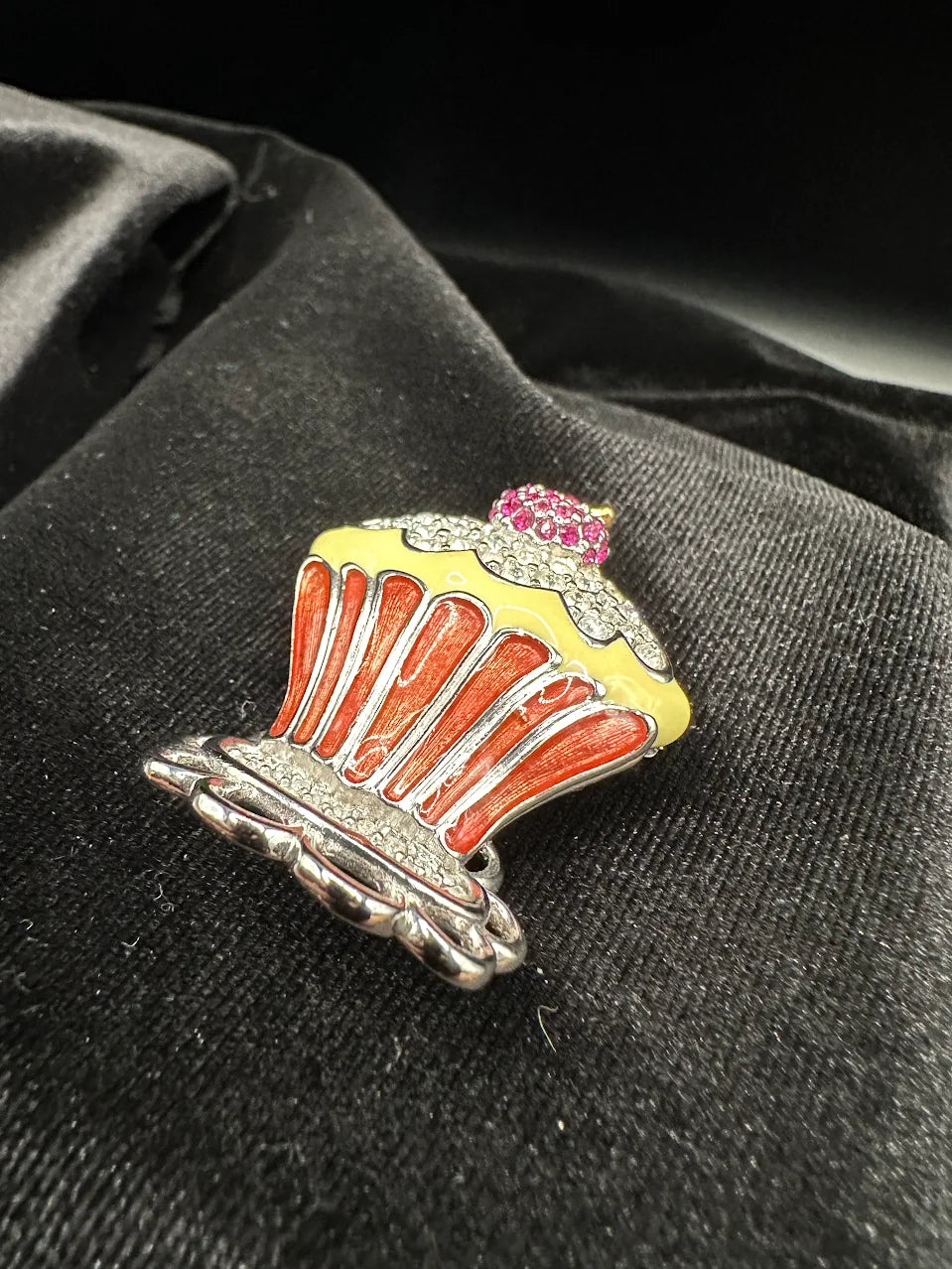 Swarovski silver-tone cupcake brooch with orange wrapper, pale yellow frosting and pink crystal top, view 2