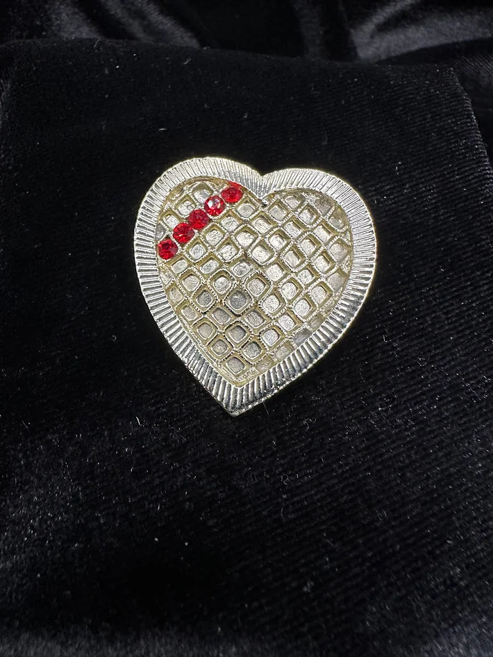 Pale gold-tone heart brooch with open lattice center and red rhinestones, view 2