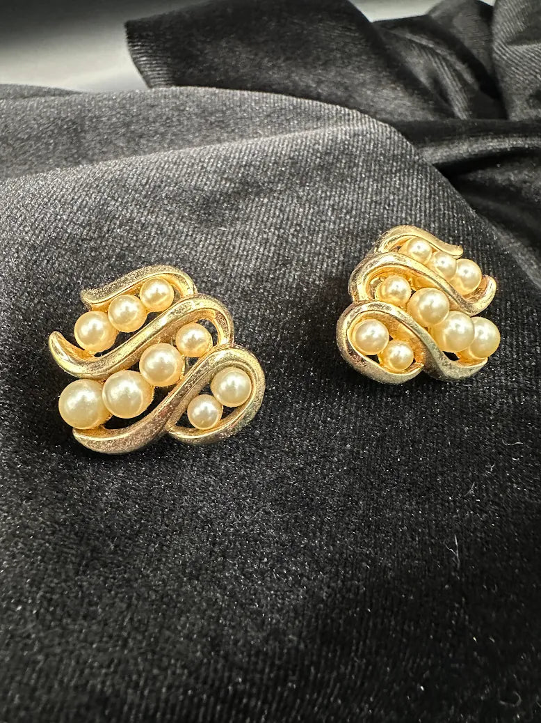 Signed Trifari gold-tone swirl clip earrings with clustered faux pearls, view 3