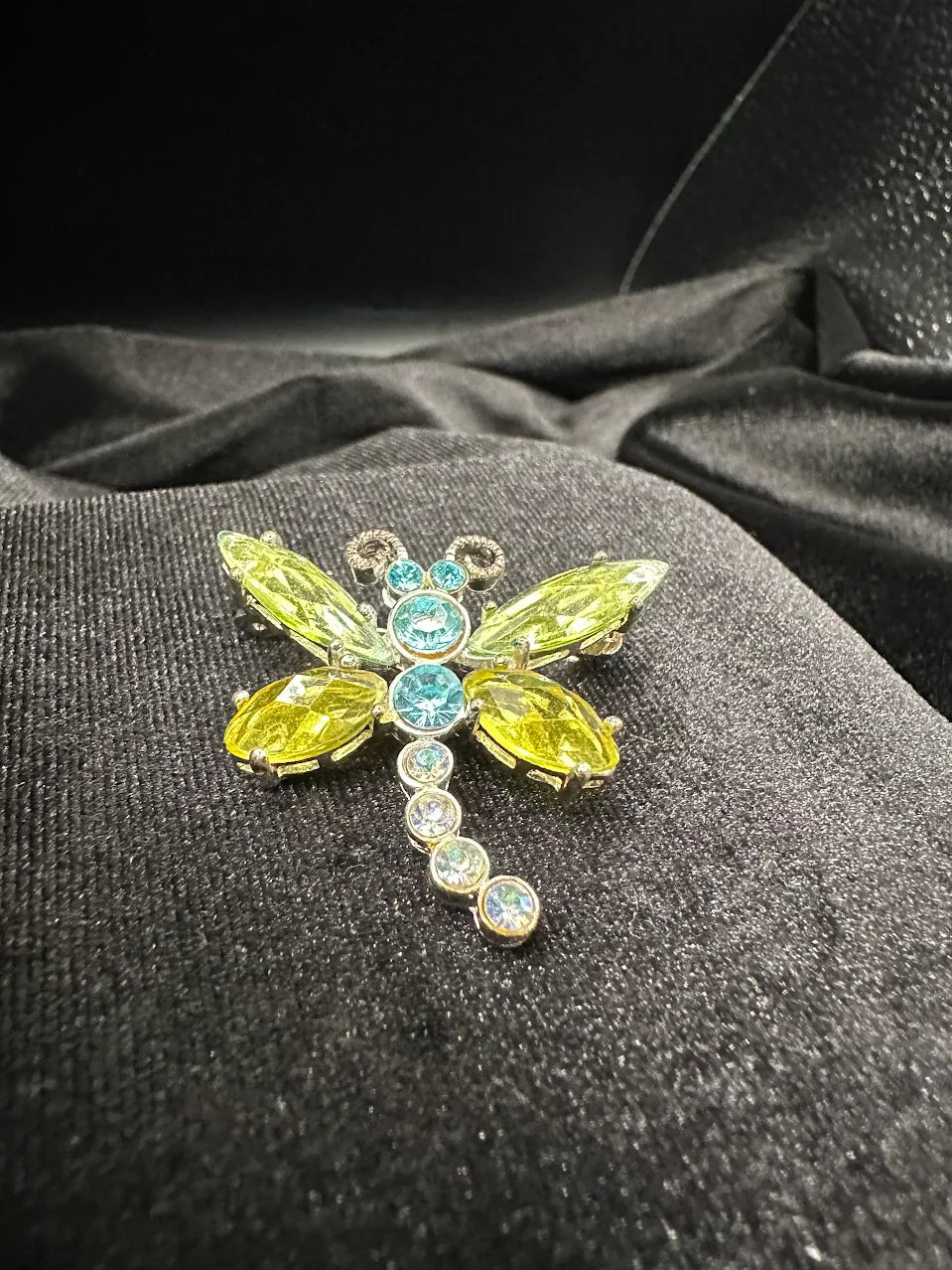 Silver-tone dragonfly brooch with green marquise crystal wings and blue crystal body, view 2