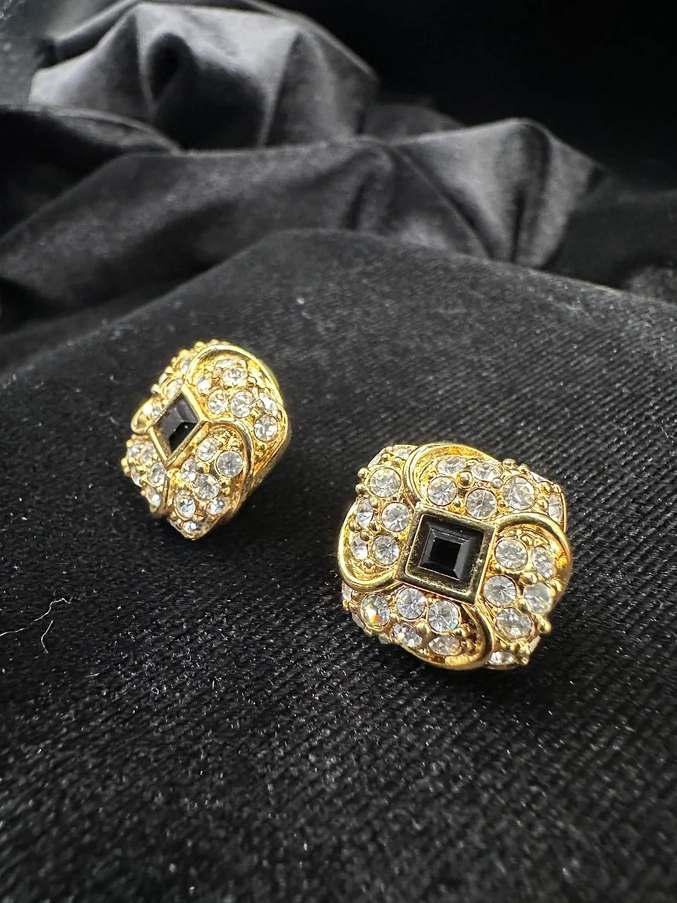 Swarovski gold-tone square post earrings with clear crystals and black square center, view 3