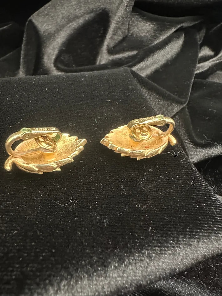 Gold-tone layered leaf clip earrings with rich texture, view 3