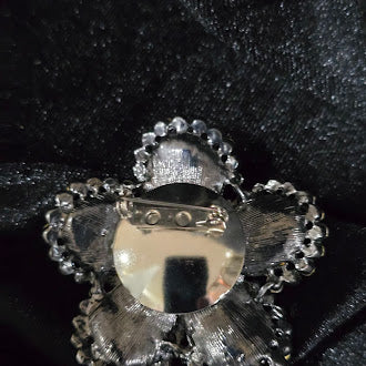 Silver-tone layered flower brooch with pink rhinestones and clear rhinestone halo, view 3