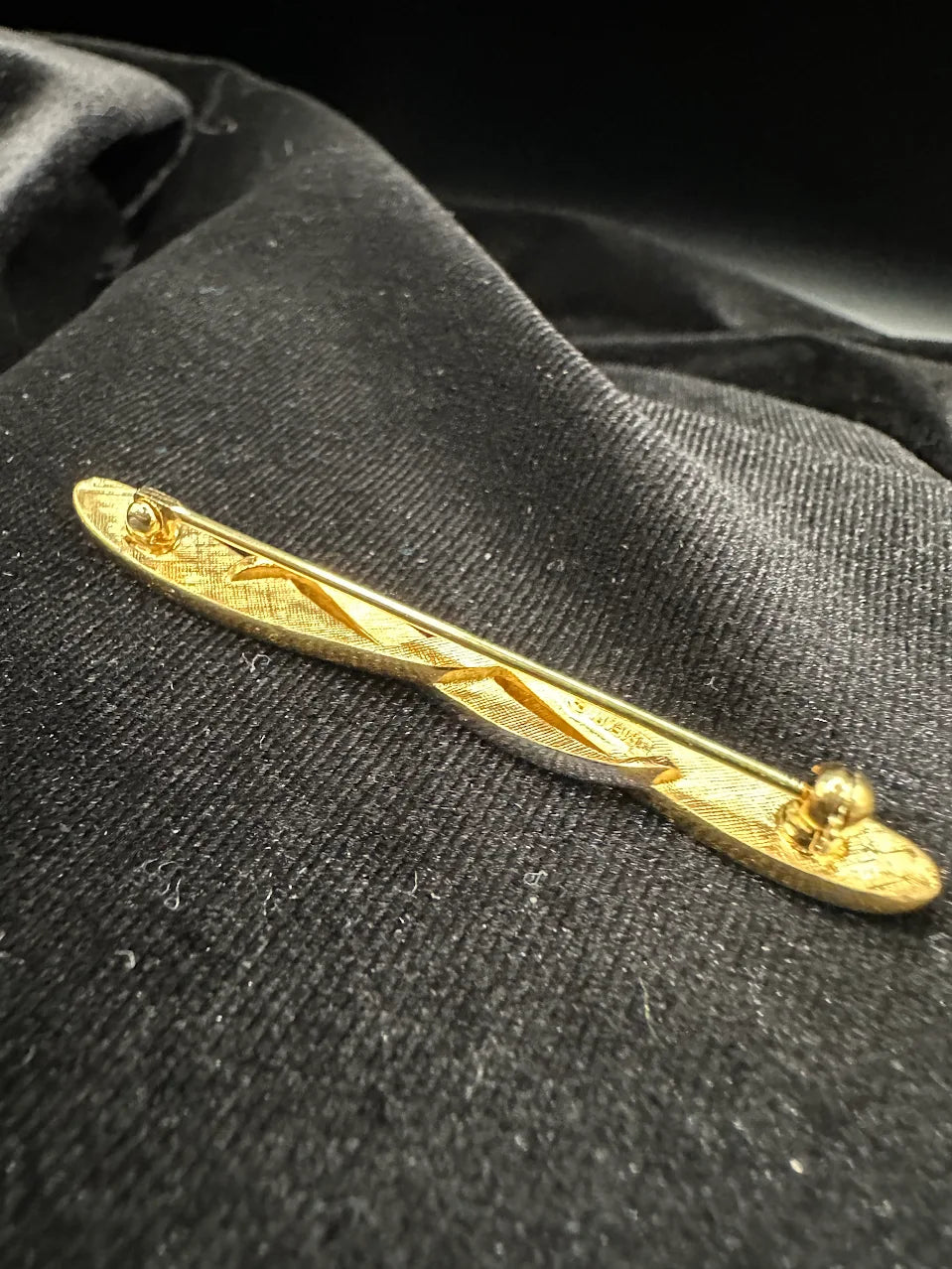 Slim gold-tone bar brooch with silver-tone curved accent, view 2