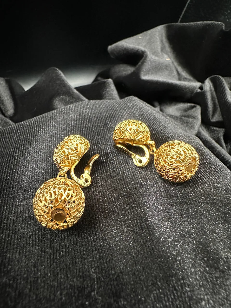 Signed Monet gold-tone rounded filigree clip earrings, view 3