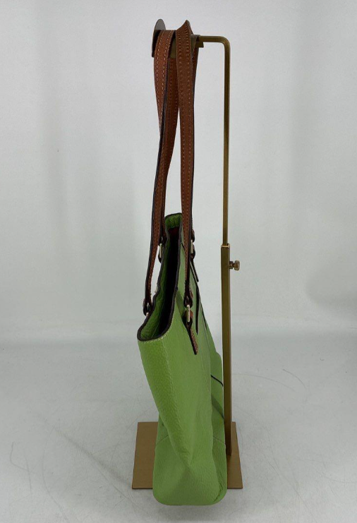 Dooney and Bourke green pebbled leather tote with brown straps and red lining, view 4