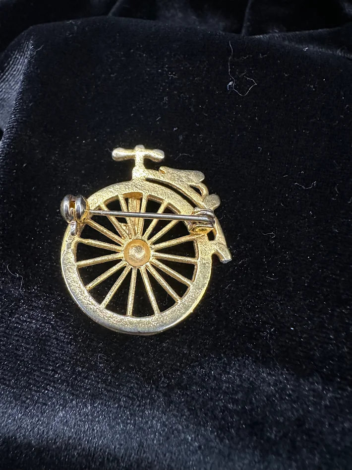 Gold-tone bicycle brooch with clear rhinestone front wheel and open spoke work, view 3