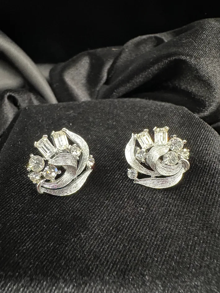 Lisner silver-tone swirl cluster clip earrings with round and baguette rhinestones, view 3