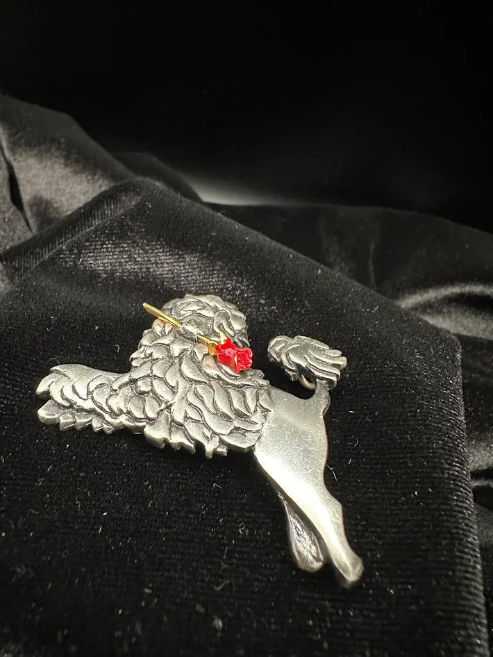 (SIGNED M FIELDS) JJ pewter poodle brooch with red flower accent