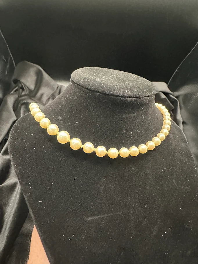 Gold Tone Cream Pearl Style Necklace with Crystal Accent Clasp