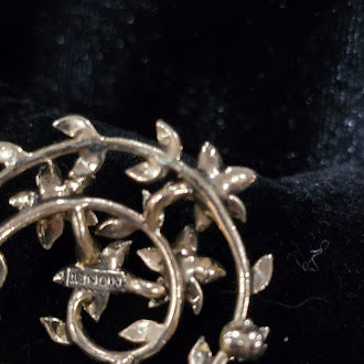 Signed Monet gold-tone vine wreath brooch with clear, lavender and green rhinestones, view 4
