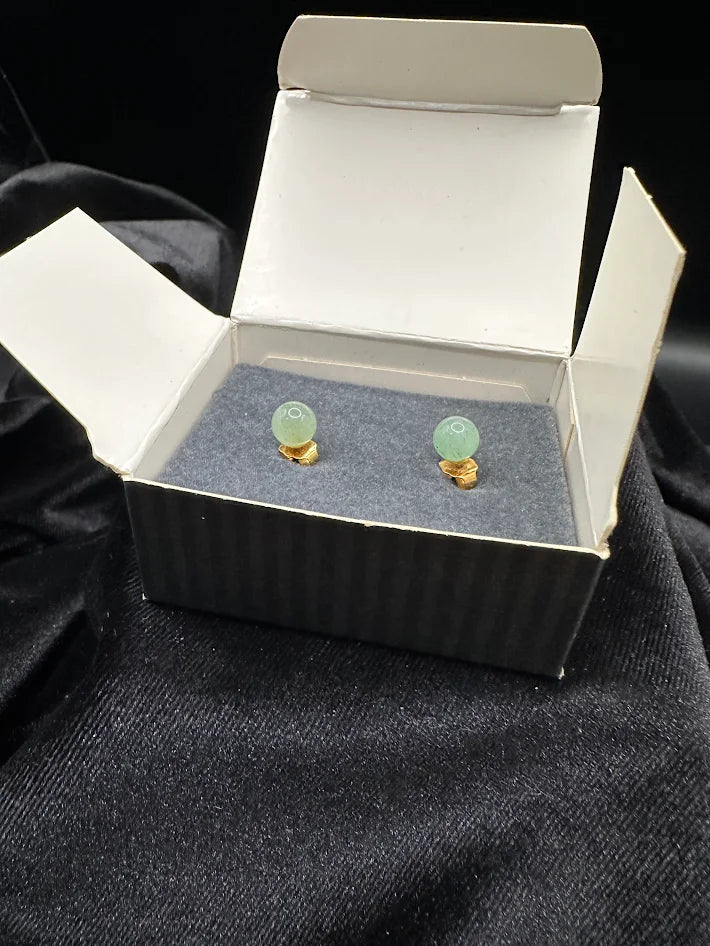 Avon gold-tone stud earrings with round soft green stones in original Avon box, view 3