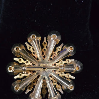 Gold-tone sunburst flower brooch with yellow and clear rhinestones in layered petals, view 4