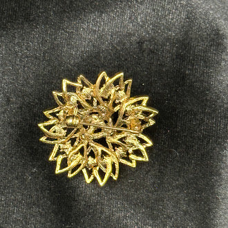 Gold-tone sunburst flower brooch with amber-toned faux pearl cluster and rhinestones, view 3