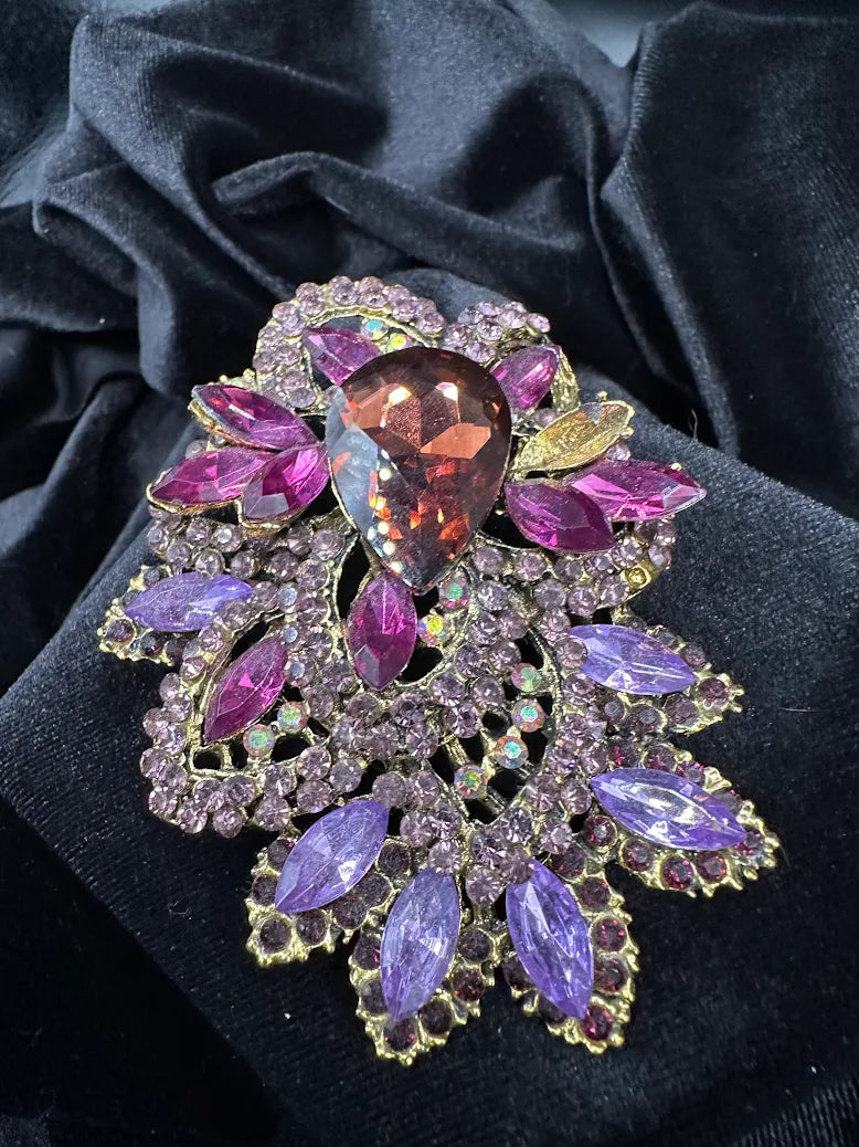 Large gold-tone floral brooch with pear-shaped purple center and pink, violet and aurora stones, view 3